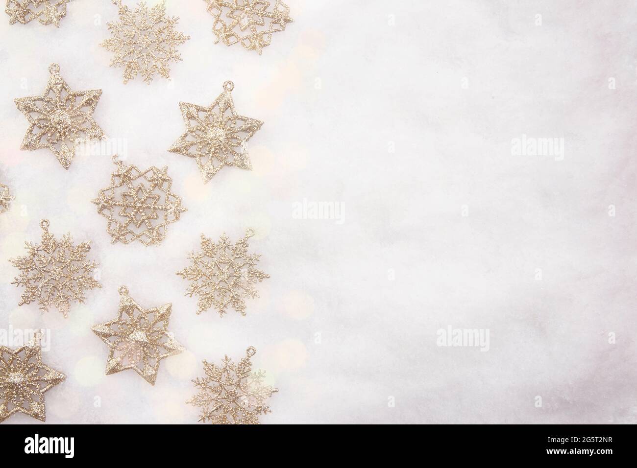 Christmas Background of Golden Snowflake Ornaments Stock Photo - Alamy