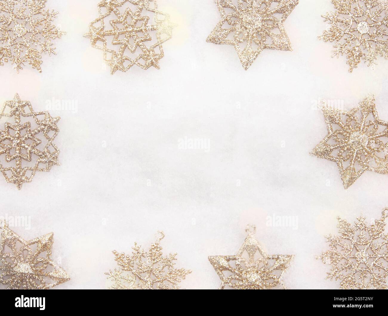 Christmas Border of Golden Snowflake Ornaments Stock Photo - Alamy