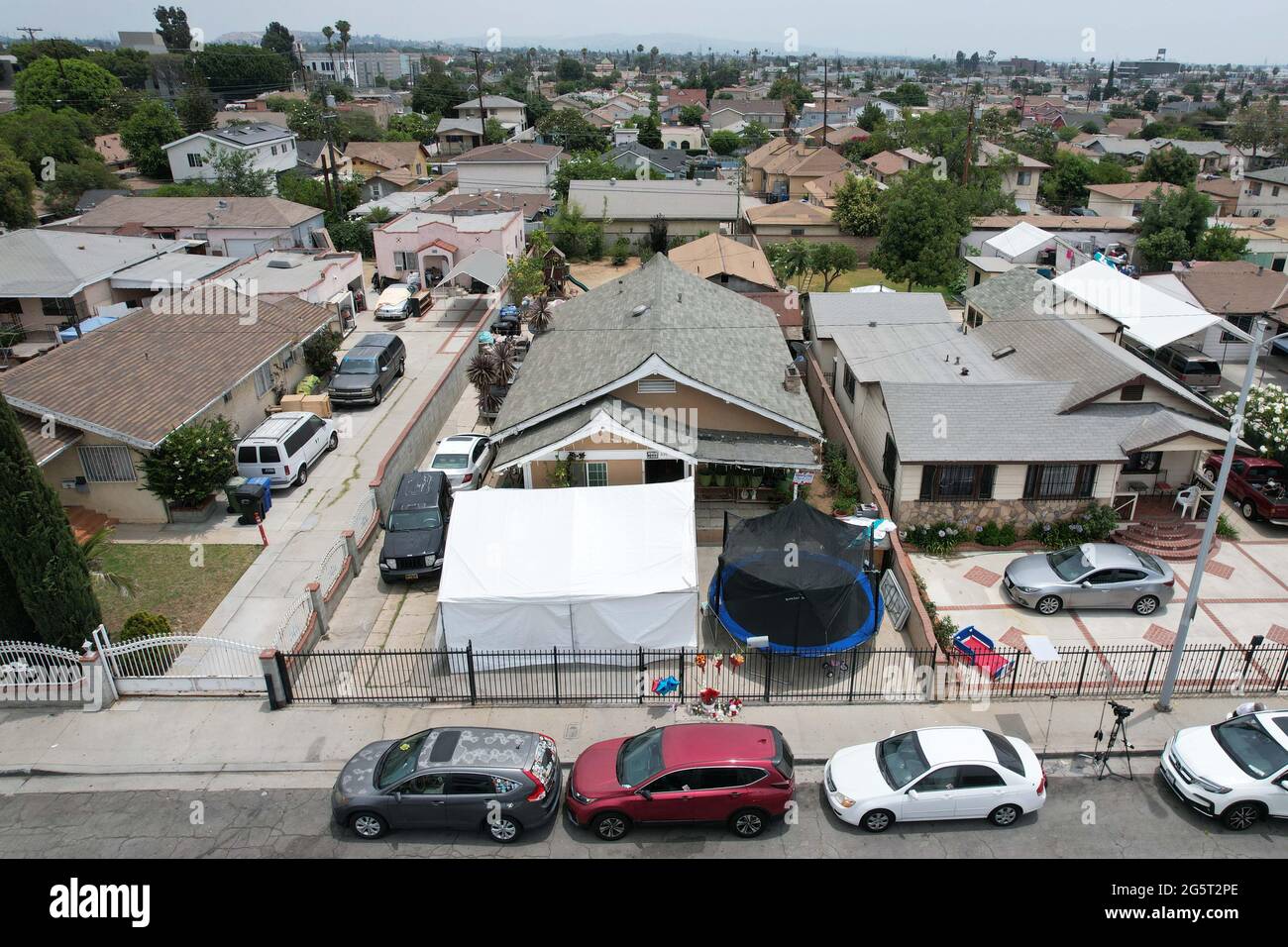 An aerial view of a residence where three children were found dead in a