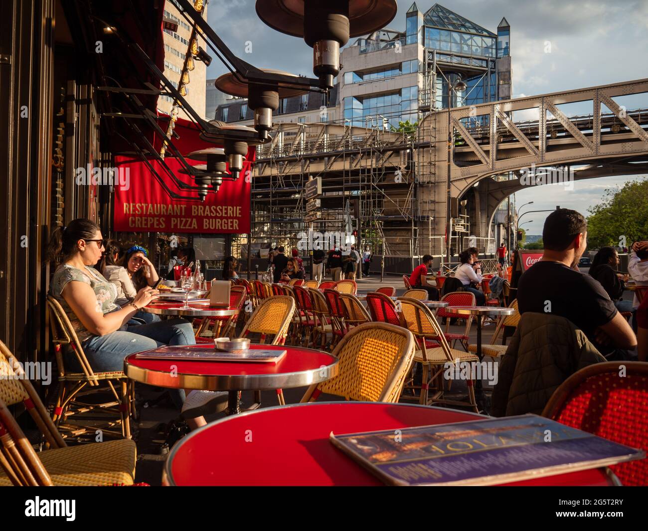 Paris, France, May 2021. Restaurants in Paris open to tourists and Parisians, red chairs, views of the streets of Paris. Times of the pandemic Stock Photo