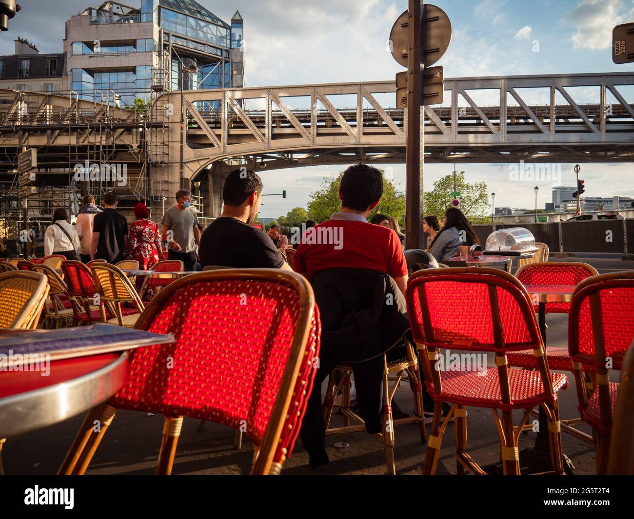 Paris, France, May 2021. Restaurants in Paris open to tourists and Parisians, red chairs, views of the streets of Paris. Times of the pandemic Stock Photo