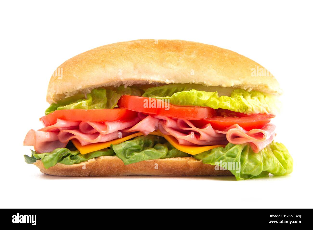 A Single Ham Sandwich with Lettuce Cheese and Tomatoes on a White Bun ...