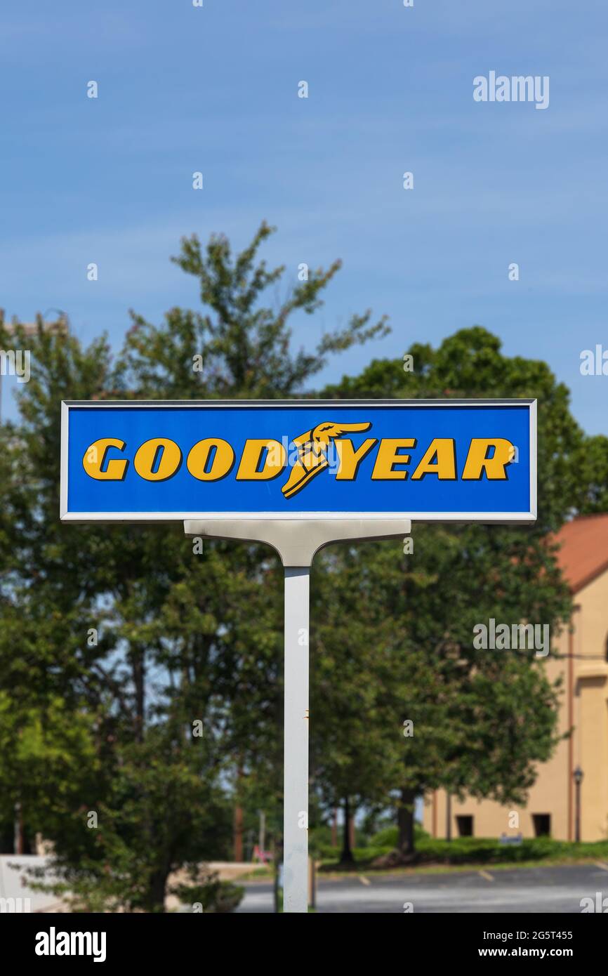 SPARTANBURG, SC, USA-13 JUNE 2021: A Goodyear Tire Co. sign and logo on tall post, blurred background. Stock Photo