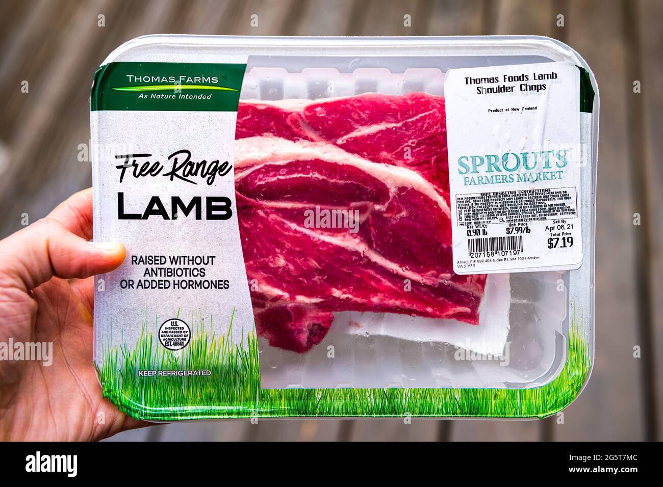 Herndon, USA - March 28, 2021: Free range red raw lamb meat shoulder chops by Thomas Foods raised without hormones in New Zealand packaged bought at S Stock Photo