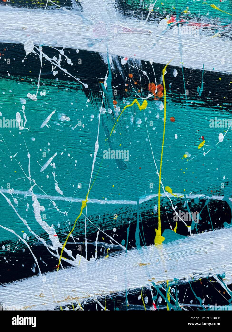 Colorful splattered artwork in green, teal and yellow tons Stock Photo