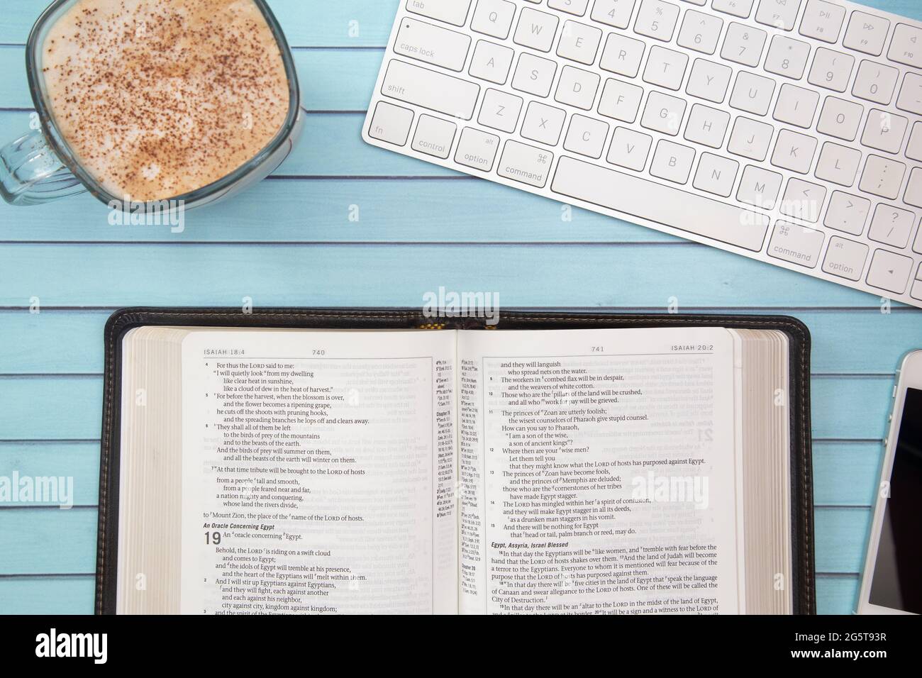 A Bible on a Wooden Table Set out for a Personal Bible Study Stock Photo