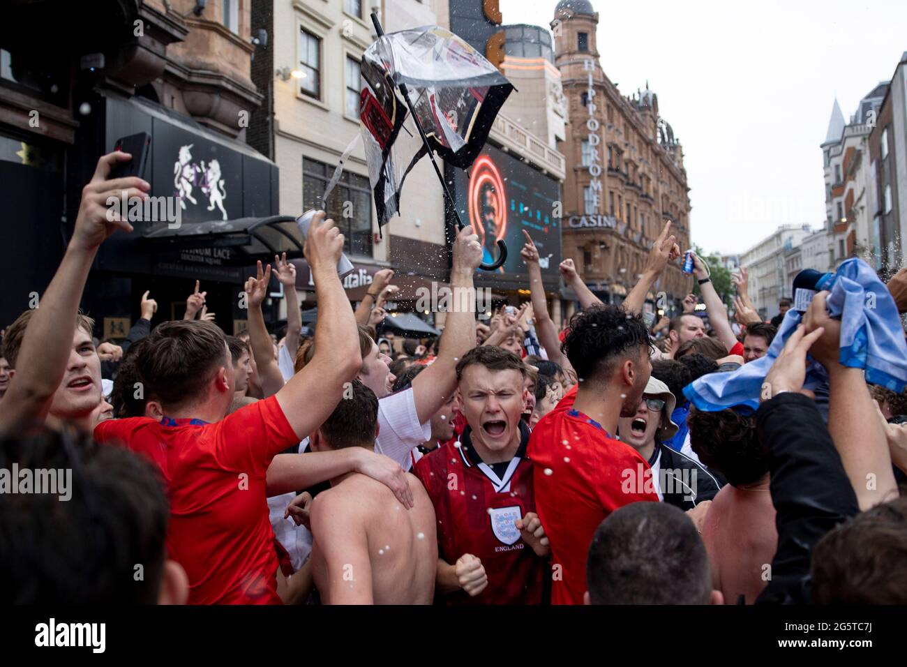 London, UK. 29th June, 2021. Crowd of football fans celebrate the win.  Hundreds of England football fans gather and celebrate the win of 2:0 over  Germany in the round of 16 of
