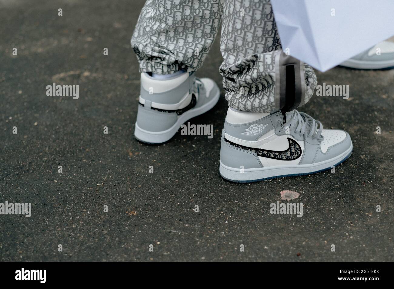 Street style, close up at Dior Spring Summer 2022 menswear show, held at  Place Vauban, Paris, France, on June 25, 2021. Photo by Marie-Paola  Bertrand-Hillion/ABACAPRESS.COM Stock Photo - Alamy