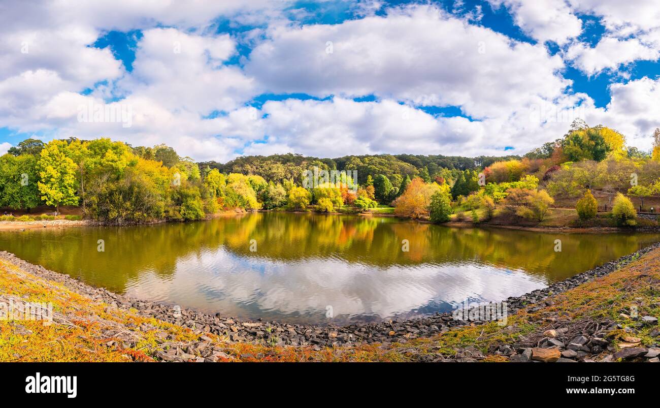 Panoramic view of Mount Lofty Botanic Garden with the pond during autumn season on a day, Adelaide Hills, South Australia Stock Photo