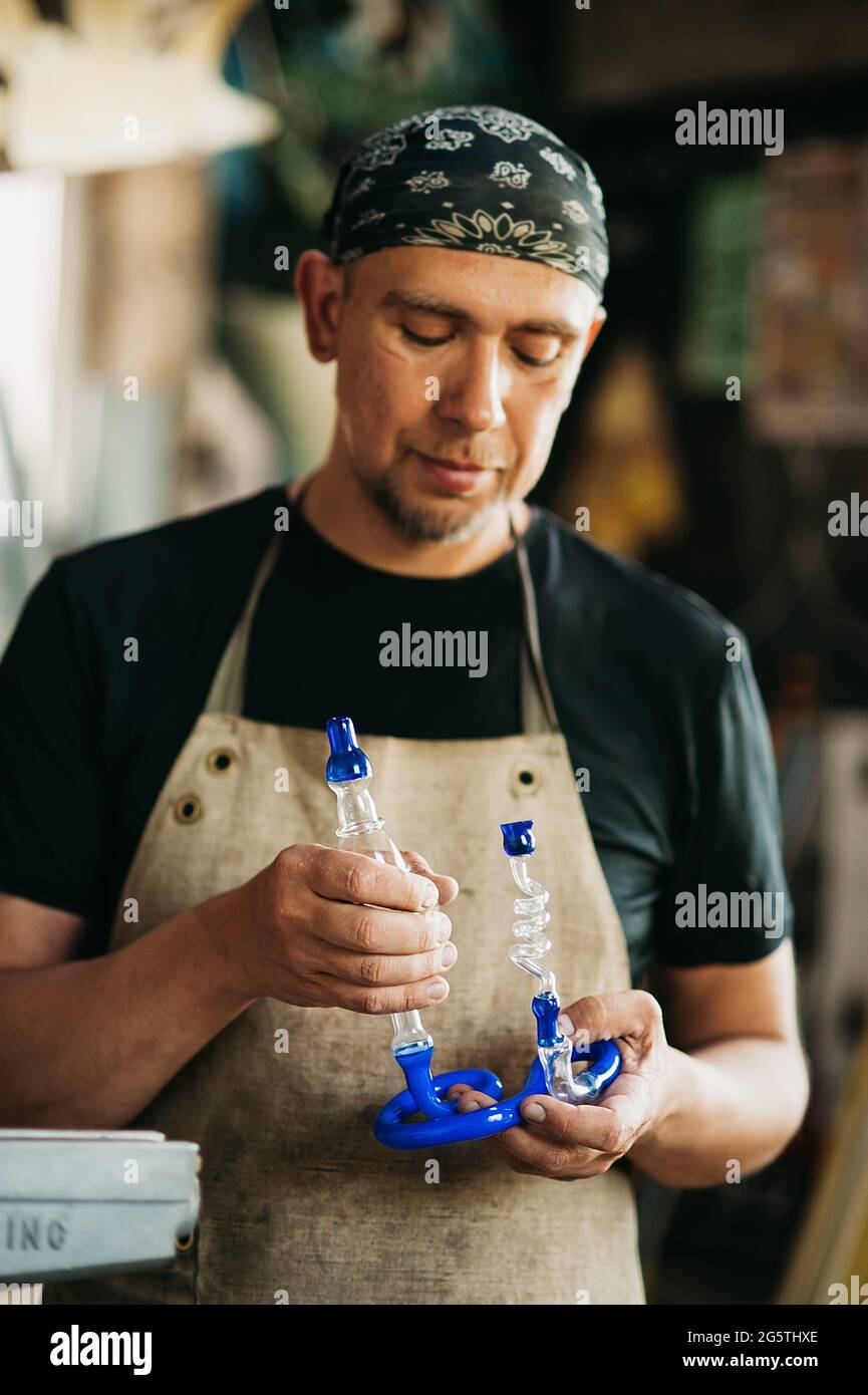 Glassblowing Burner with ready glass product. Production of