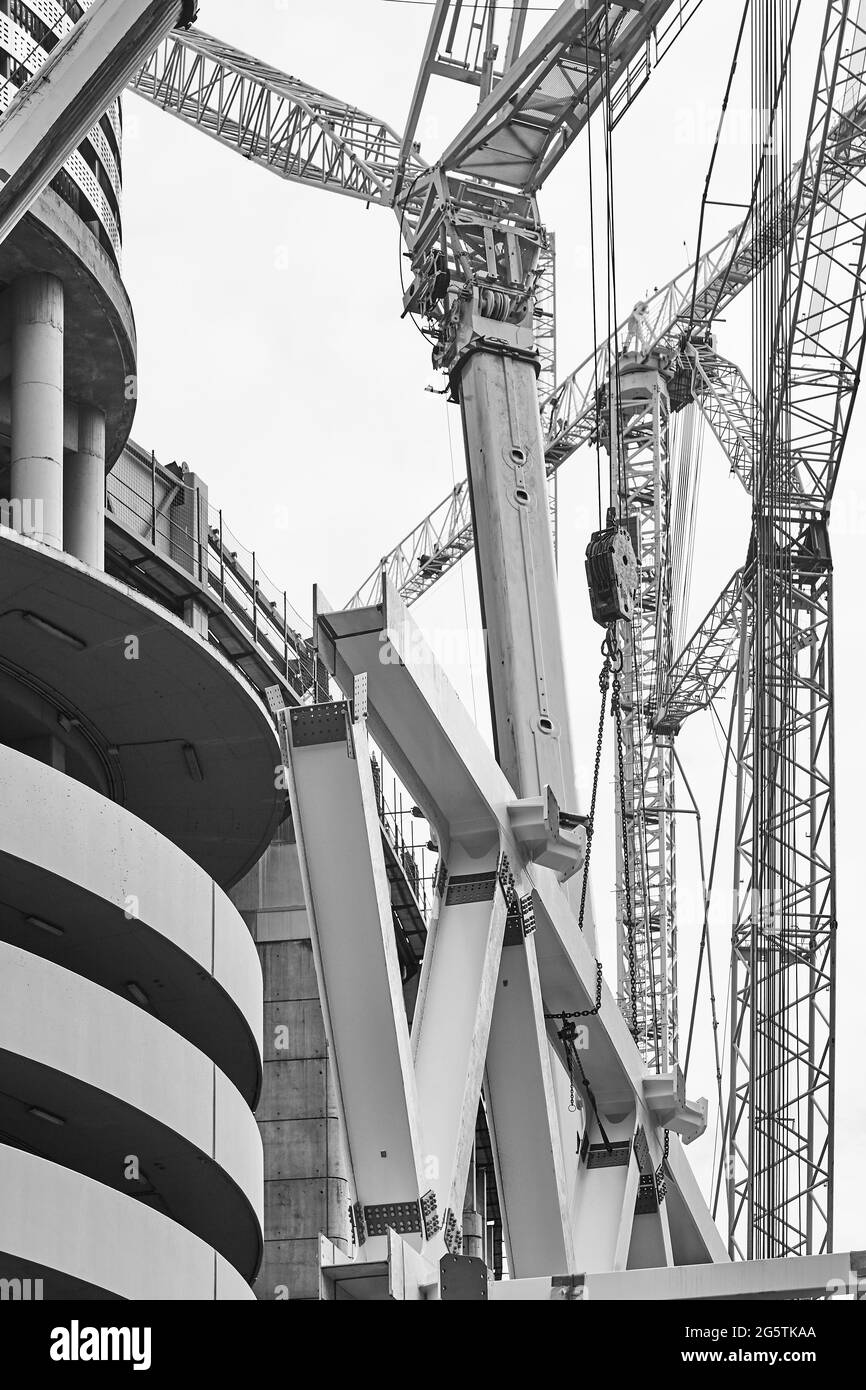 Industrial cranes building site in Black and White Stock Photos ...