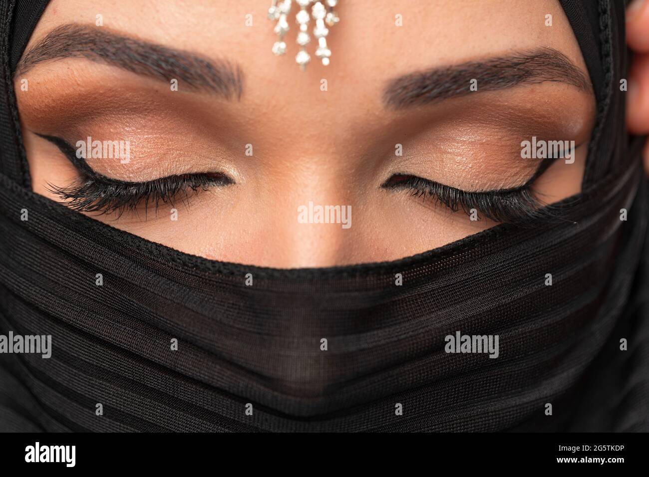 Close up portrait of beautiful muslim girl dressed in hijab Stock Photo ...