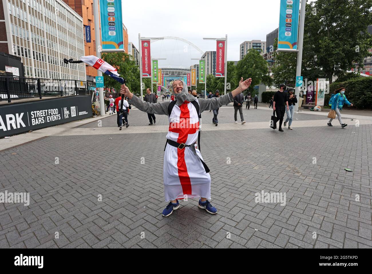 London, UK. 29th June, 2021. An England fan dressed up in the flag of ...