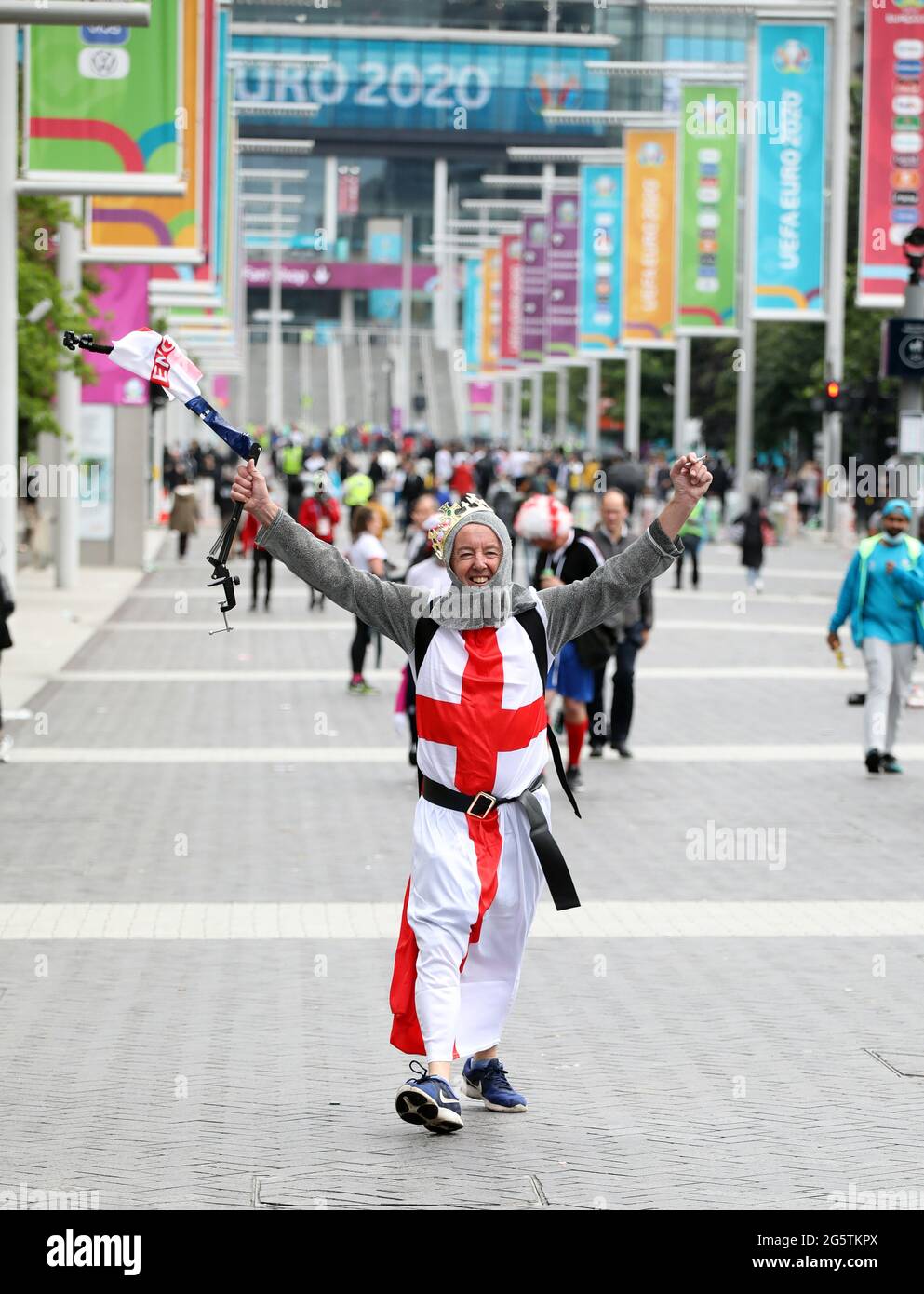 London, UK. 29th June, 2021. An England fan dressed up in the flag of ...