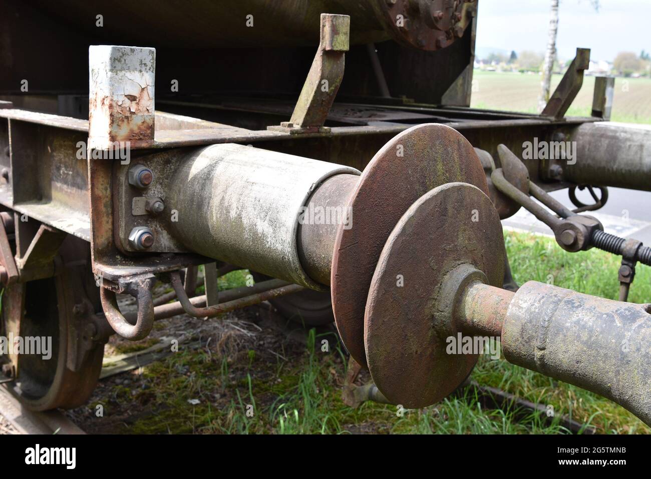Close up view on pneumatic model of a buffer system used on the railway for attaching railway vehicles to one another. Stock Photo
