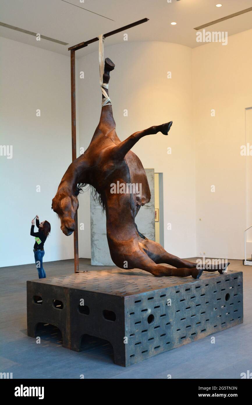 BELGIUM. FLANDERS. GHENT. EXHIBITION OF THE WORK OF THE ITALIAN ARTIST MAURIZIO CATTELAN AT THE SMAK, TLE MUSEUM FOR ACTUAL ART IN GHENT. Stock Photo