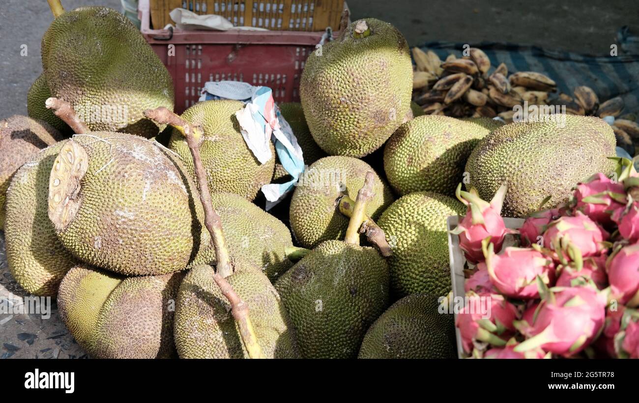 Durian Fresh Fruit and Dragon cuidFruit at Klong Toey Market Wholesale Wet Market Bangkok Thailand largest food distribution center in Southeast Asia Stock Photo
