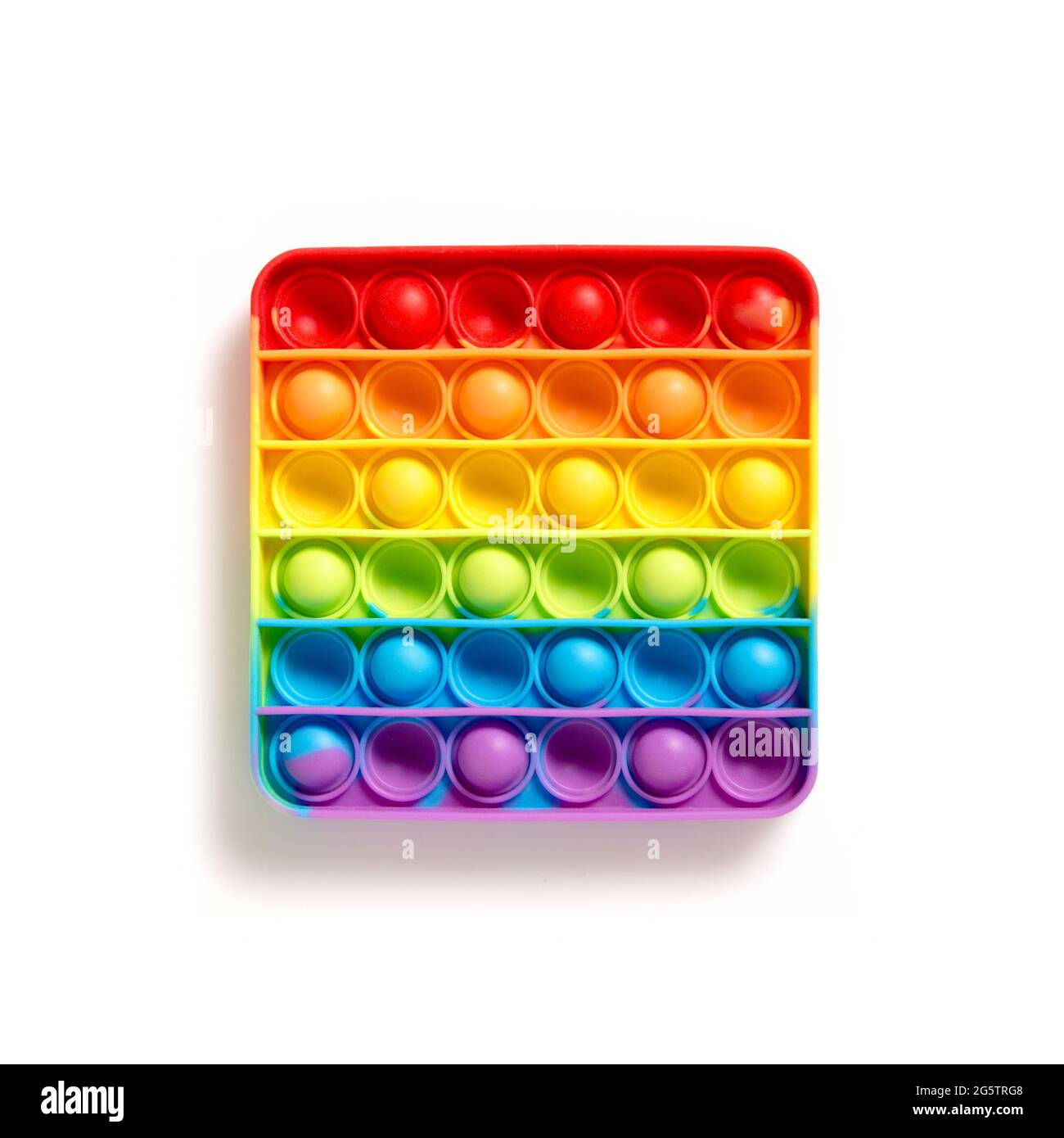Antistress rainbow pop it fidget on white background. Simple dimple sensory  game for child, development of the motor skills for hands and fingers. Pop  Stock Photo - Alamy
