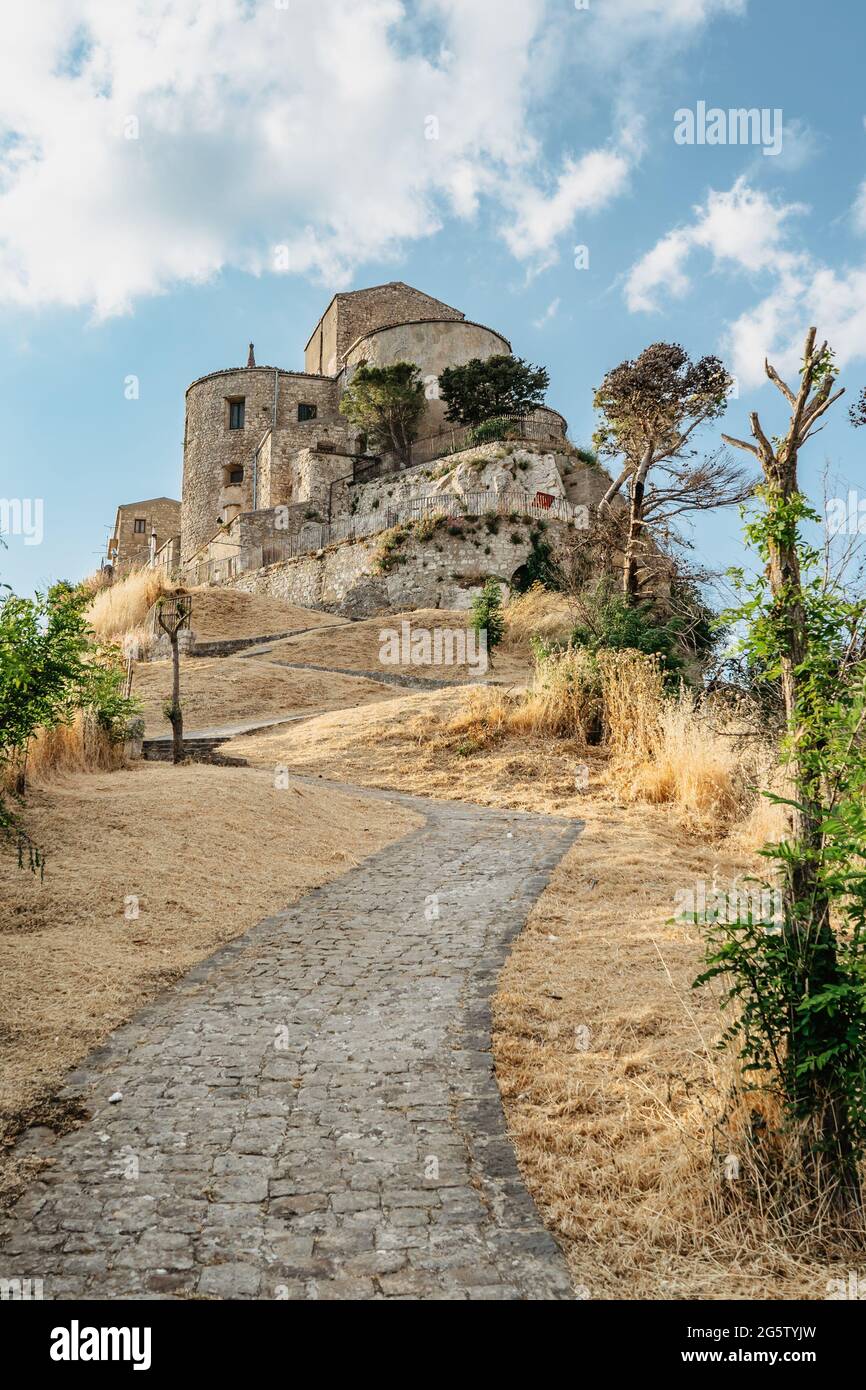 Stone village of Petralia Soprana,the highest village in Madonie mountain range,Sicily,Italy.Church of Santa Maria di Loreto at sunset.Picturesque Stock Photo