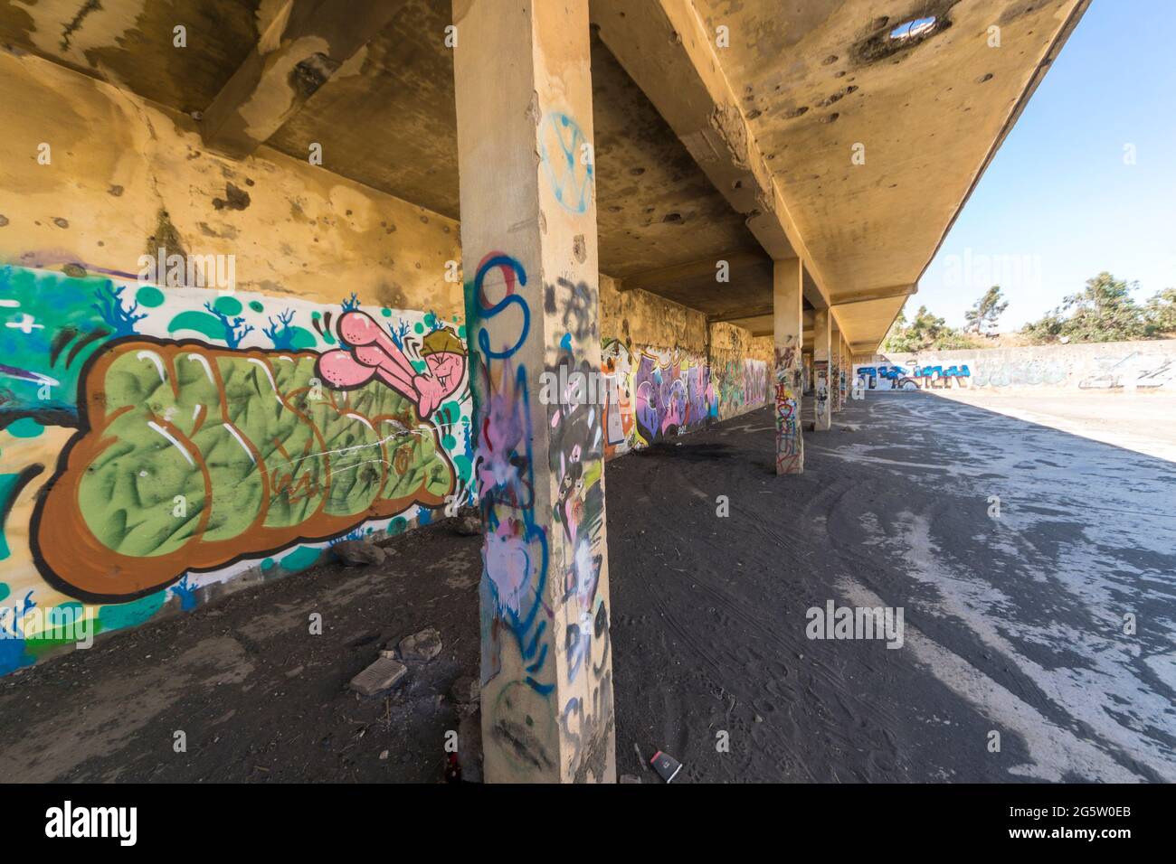 Golan Heights, Israel. The former HQ building of the Syrian intelligence service, now abandoned and graffitti-covered. Stock Photo