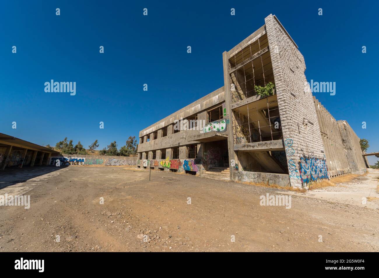 Golan Heights, Israel. The former HQ building of the Syrian intelligence service, now abandoned and graffitti-covered. Stock Photo