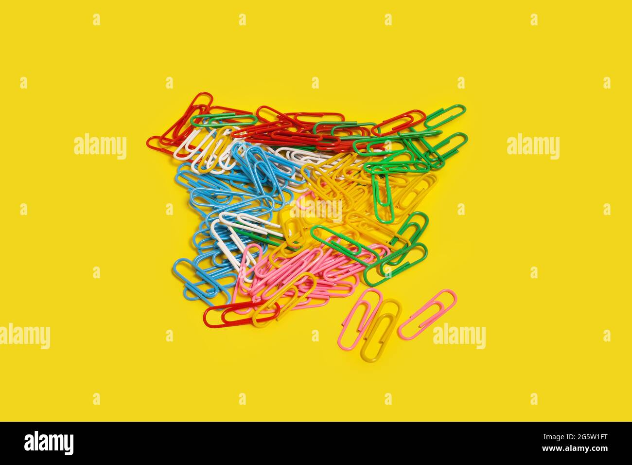 diversity of multicolored paper clips. office accessories Stock Photo