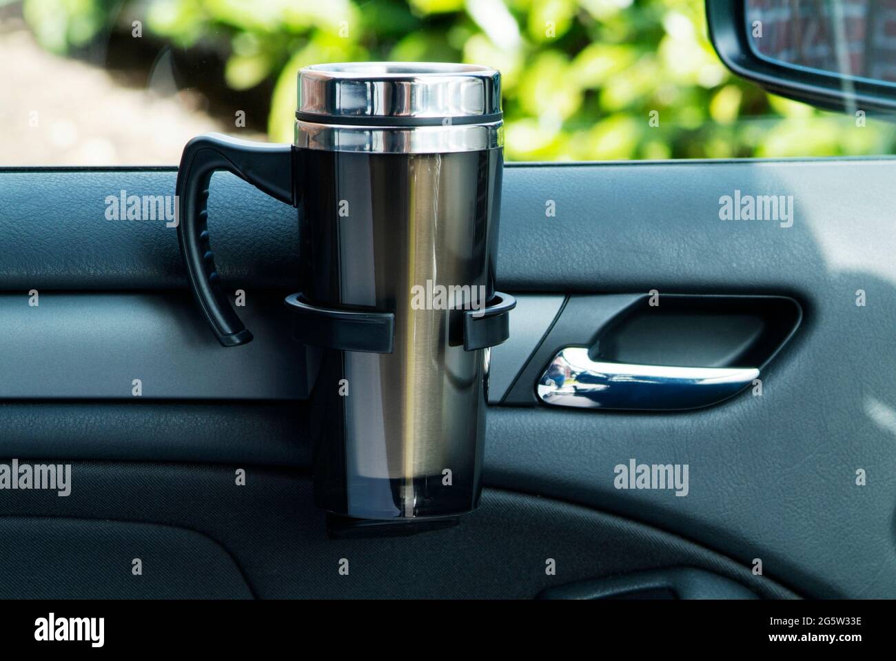 Car door with coffee cup attachment hires stock photography and images
