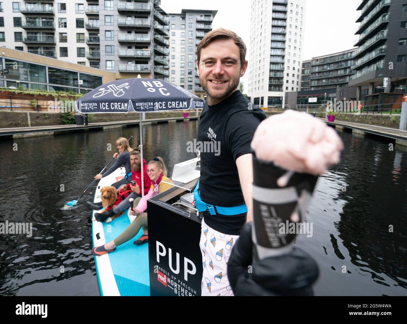 Northern Bloc Director Josh Lee serves ice creams are from the Paddle