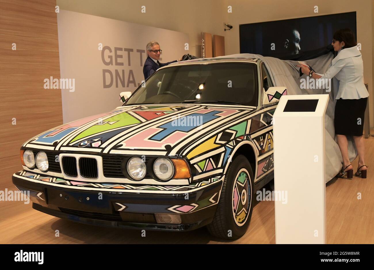 Milan, Italy. 30th June, 2021. Milan, Italy BMW Milano Urban Store The  speed of the arts. Science Massimiliano Di Silvestre president of AD BMW  Italia presents the BMW 525i from 1991 created