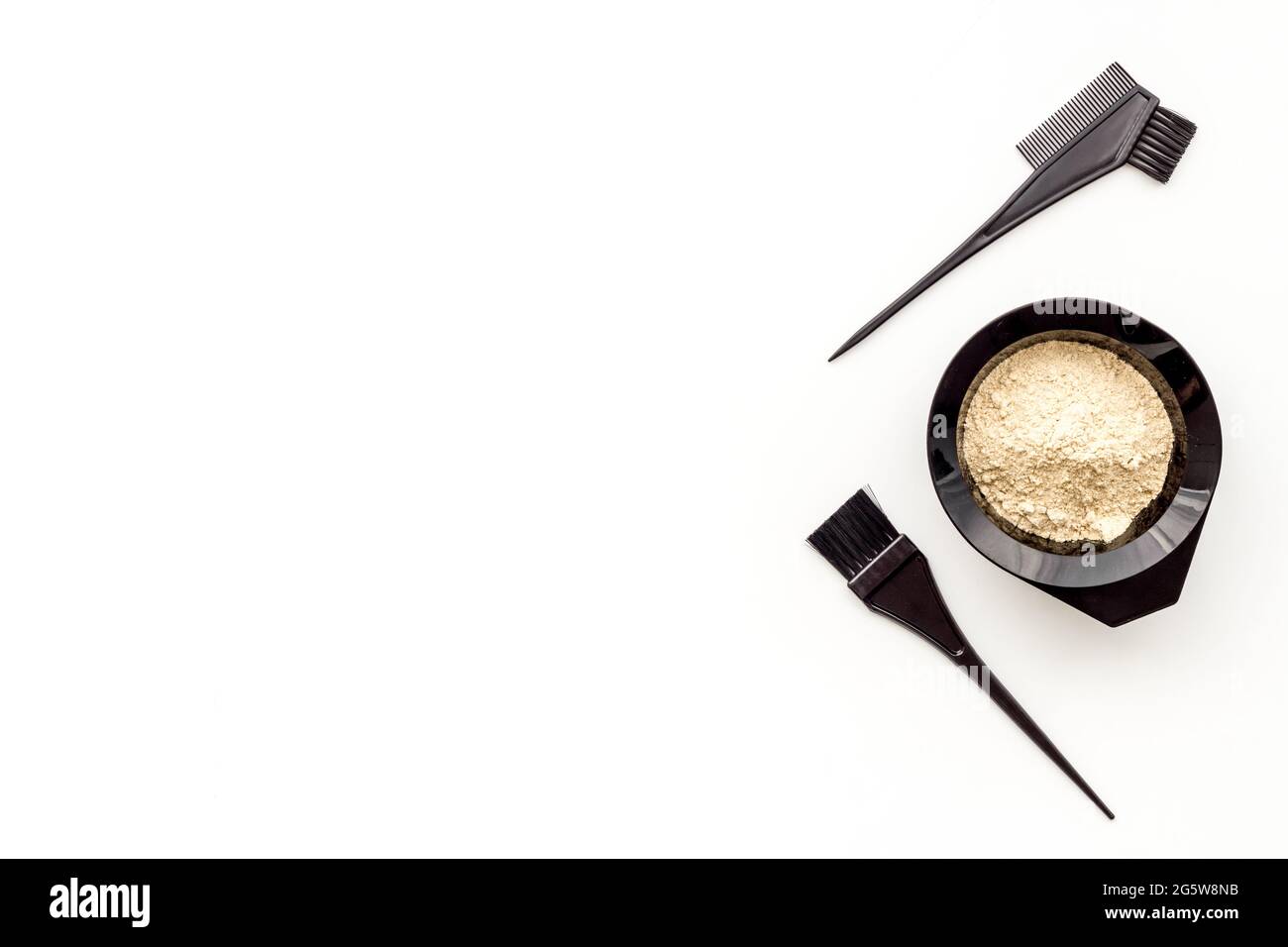 Mixing hair dye in bowl with brush, top view Stock Photo Alamy