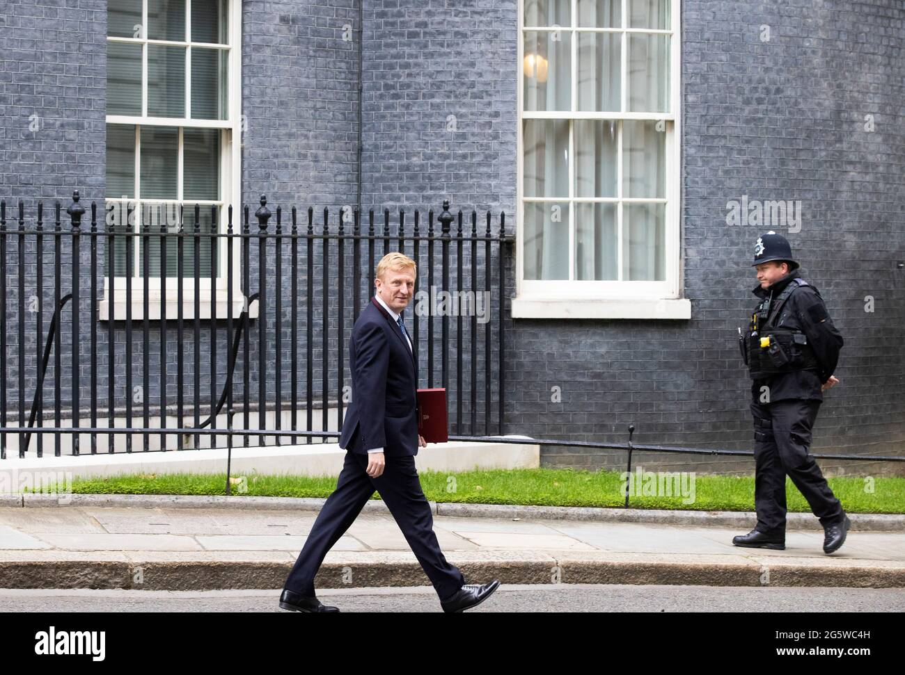 London, UK. 30th June, 2021. Oliver Dowden, Secretary of State for Digital, Culture, Media and Sport, leaves10 Downing Street after a meeting. The colourful installation is celebrating Global Pride week. Credit: Mark Thomas/Alamy Live News Stock Photo