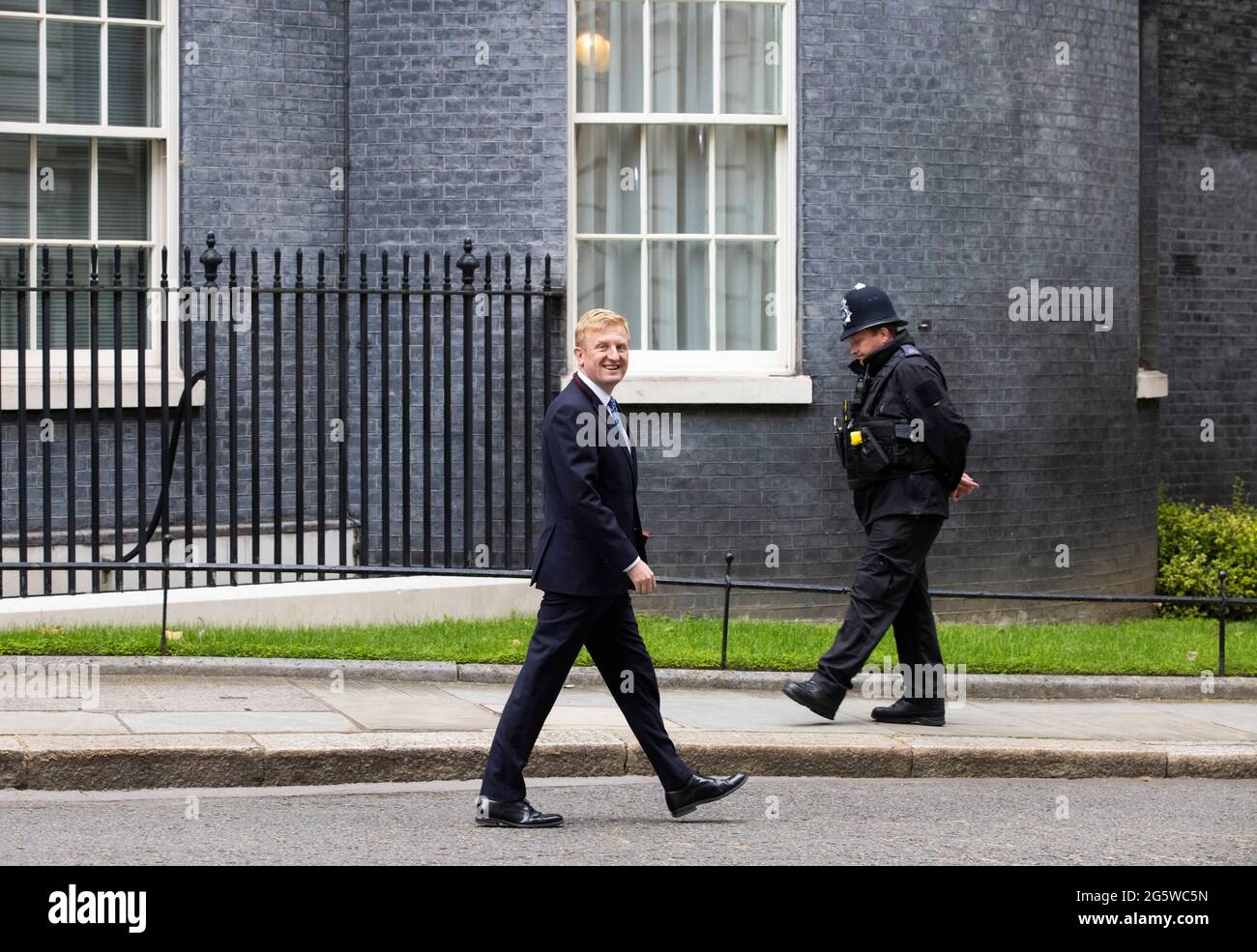 London, UK. 30th June, 2021. Oliver Dowden, Secretary of State for Digital, Culture, Media and Sport, leaves10 Downing Street after a meeting. The colourful installation is celebrating Global Pride week. Credit: Mark Thomas/Alamy Live News Stock Photo