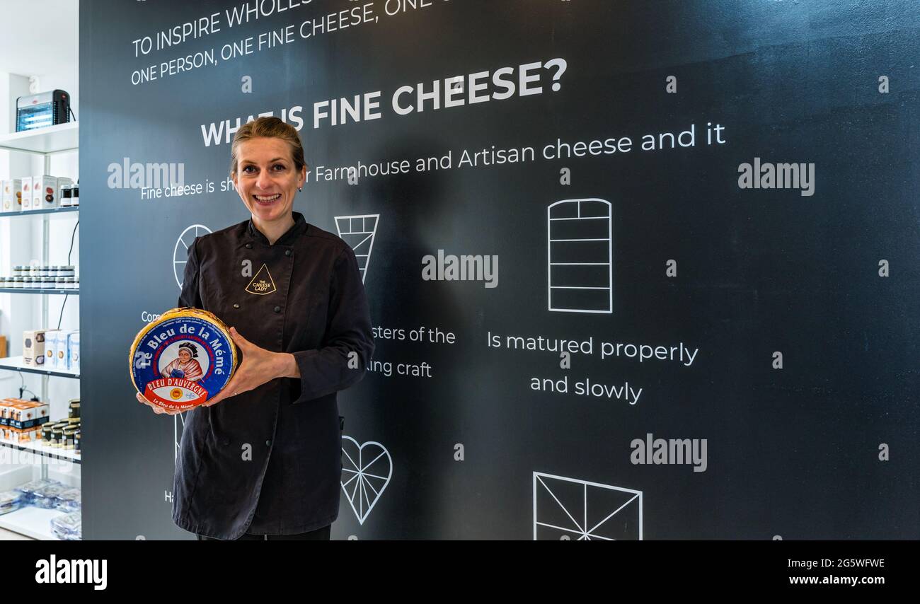 Haddington, East Lothian, Scotland, UK, 30th June 2021. The Cheese Lady new shop: Svetlana Kukharchuk aka The Cheese Lady, a fromager affineur moves to new premises. Pictured: Svetlana with French Blue D'Auvergne cheese Stock Photo