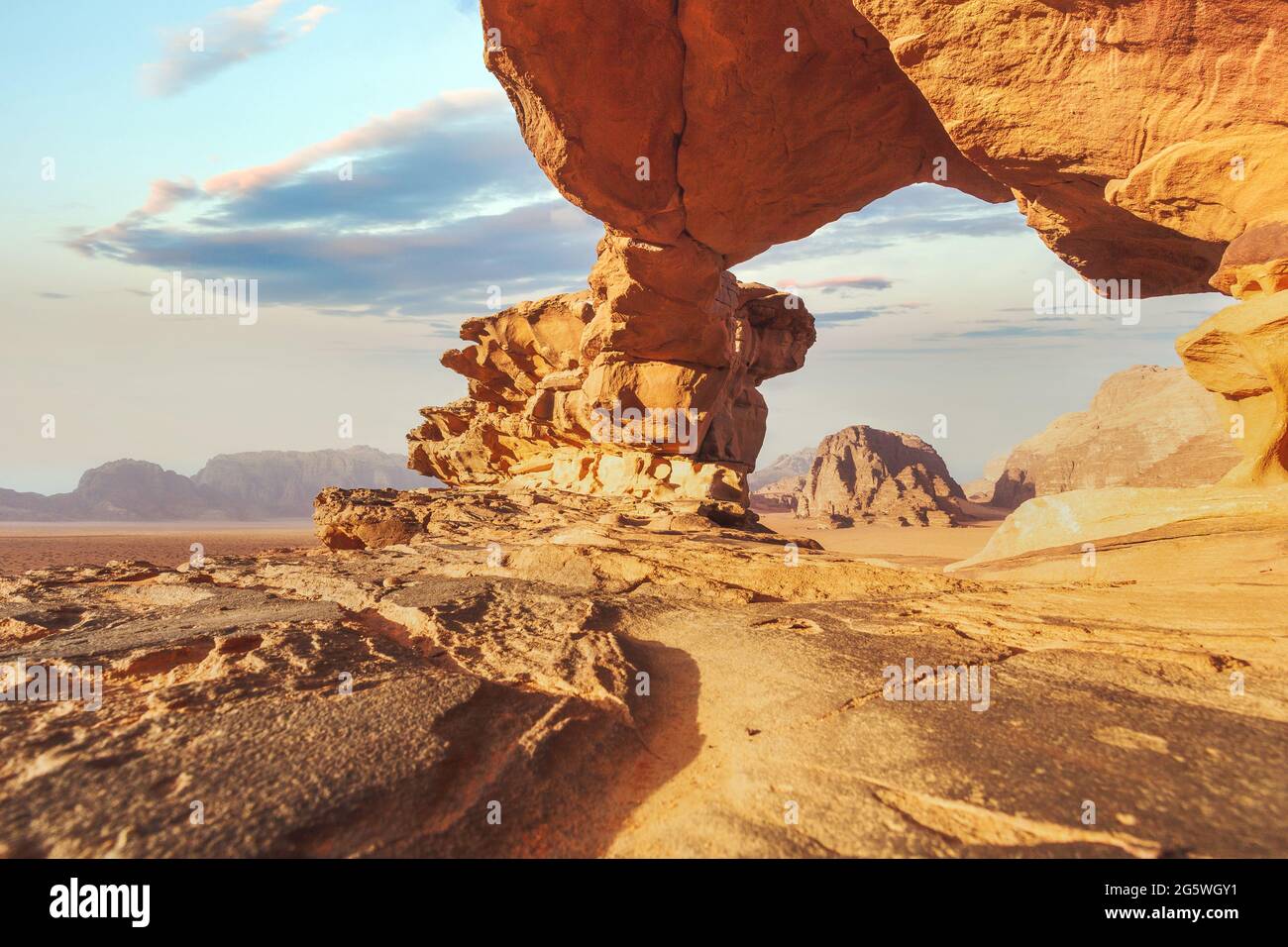 Panoramic view of natural rock bridge and Wadi Rum desert, Jordan Stock Photo
