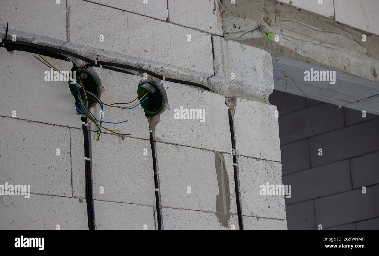 Electrical wiring in the house. Electric cable laying. Selective focus