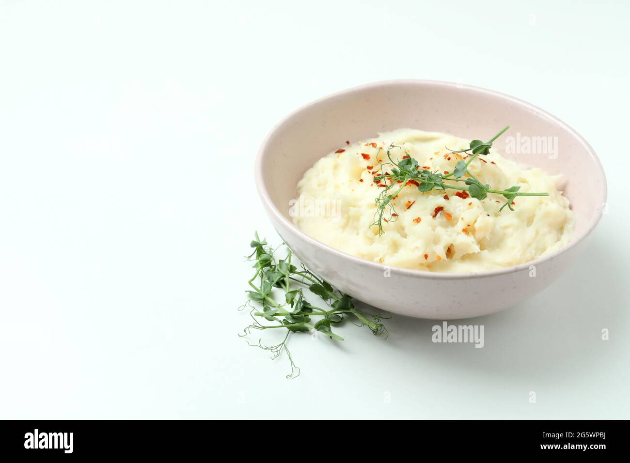 Plate of mashed potatoes on white background Stock Photo