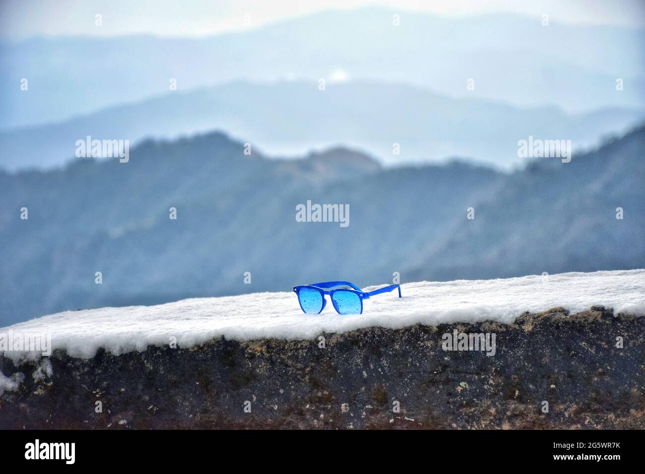 sunglass on snow Stock Photo