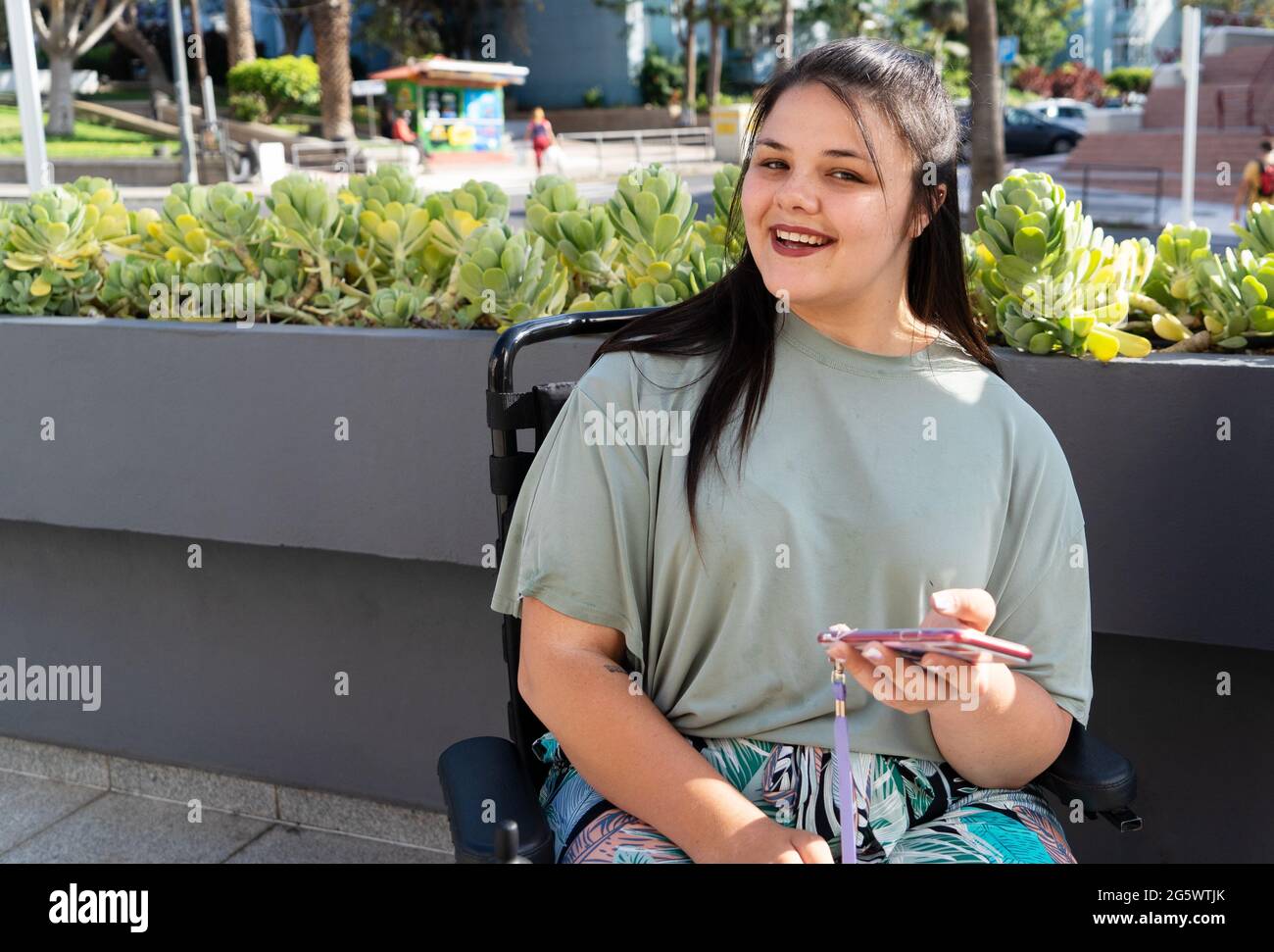 disabled young woman in wheelchair Stock Photo - Alamy