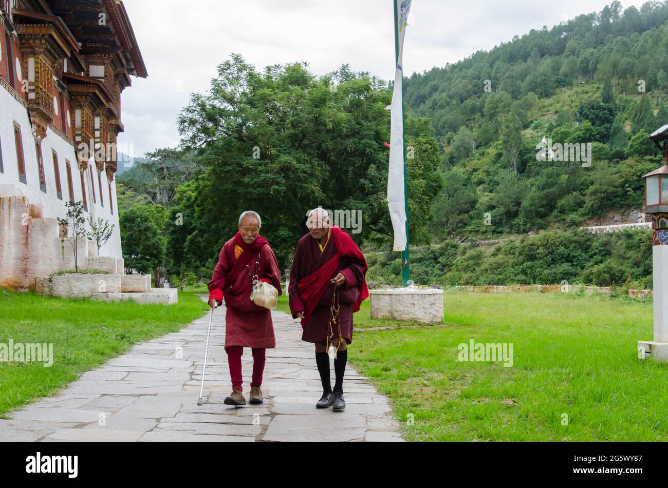 Two senior Buddhist monk having a discussion. Selective focus. Punakha, Bhutan Stock Photo