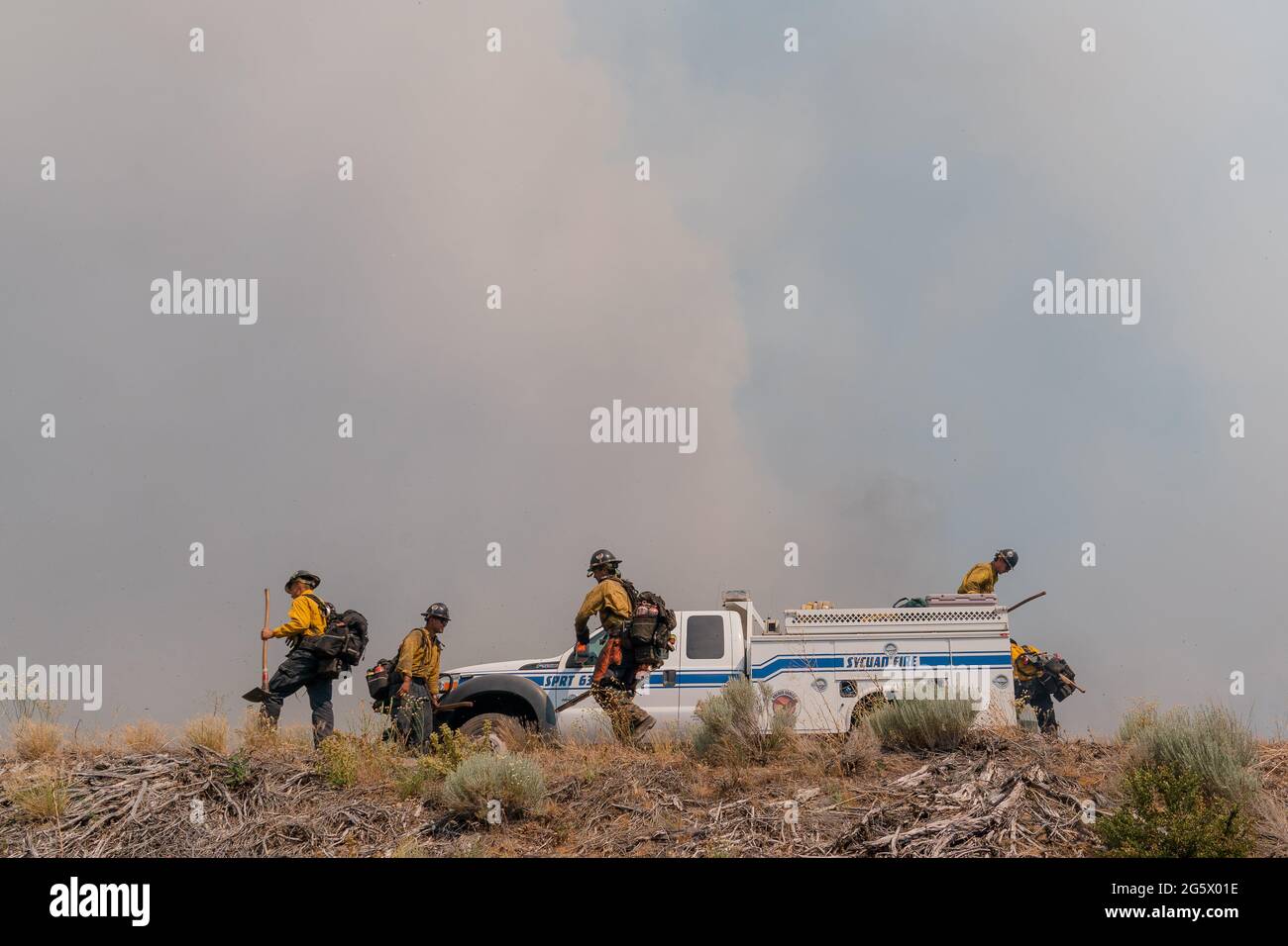 Weed, California, USA. 29th June, 2021. Members of the Golden Eagles Hotshots, California's only Bureau of Indian Affairs crew, prepare to fight the Lava Fire. Credit: Jungho Kim/ZUMA Wire/Alamy Live News Stock Photo