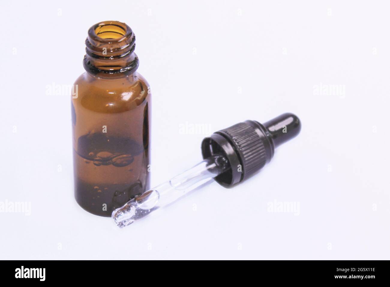 serum pipette and bottle on white background Stock Photo Alamy