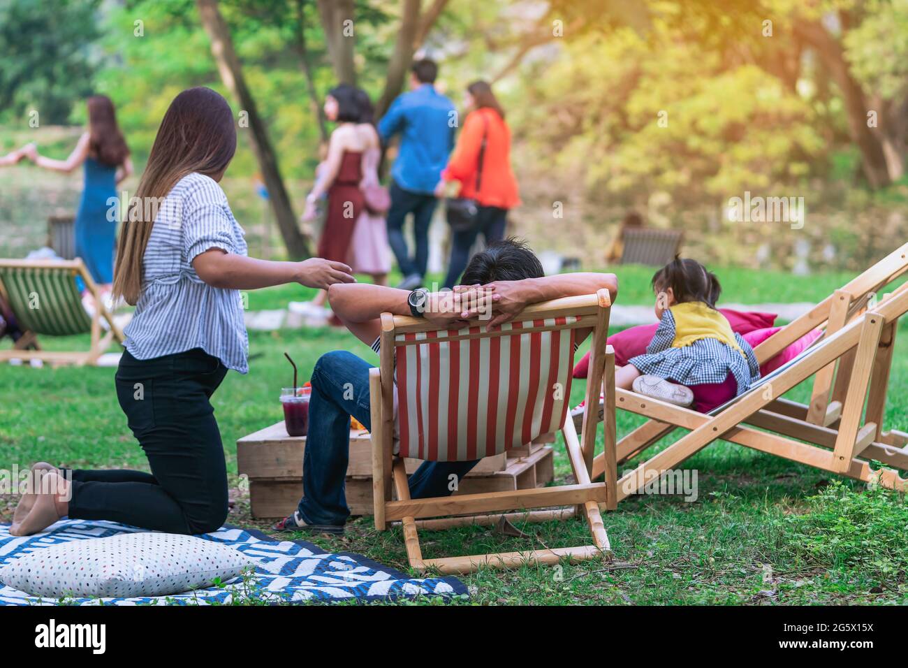 Asian family picnic table in park hi-res stock photography and images ...