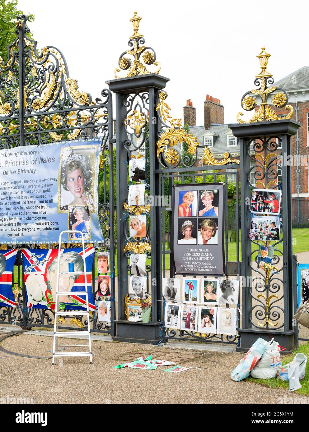 Kensington Palace, London, June 2021.  Princess Diana charity putting up banners and posters put side the palace to commemorate her 60th Birthday on 1 Stock Photo