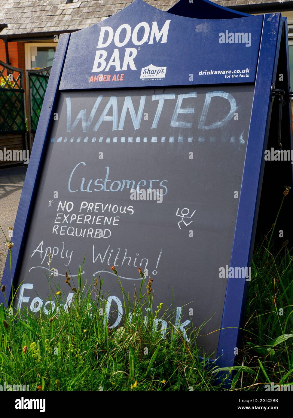 Sign outside restaurant of Bude golf club, lifting of covid restriction and lack of customers causing problems for the hospitality businesses, Cornwal Stock Photo