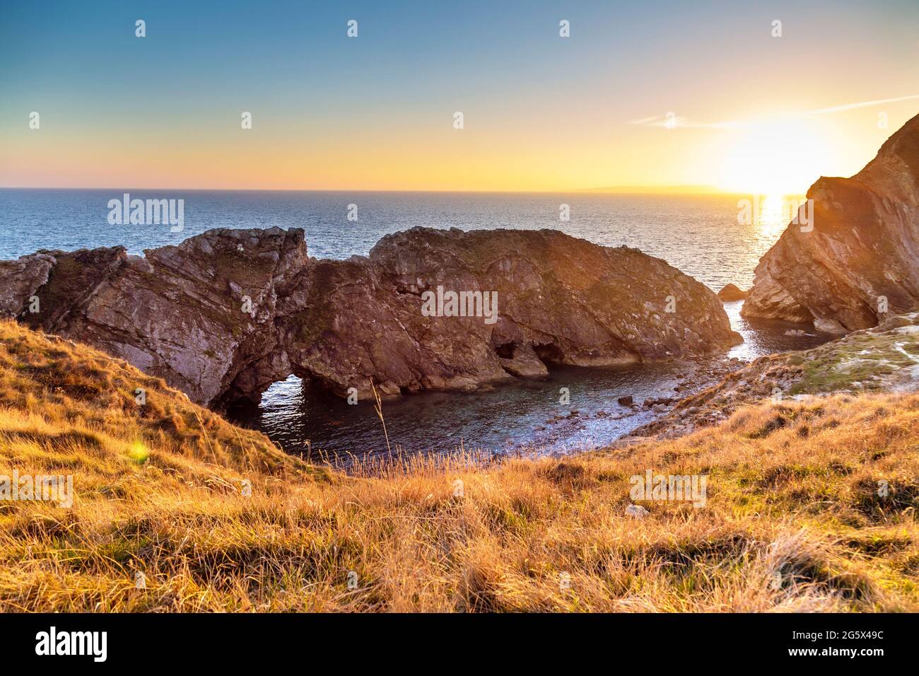 Stair Hole at sunset at Lulworth Cove, Dorset, UK Stock Photo