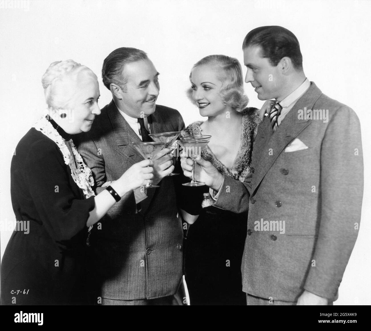 LOUISE CLOSSER HALE WALTER CONNOLLY CAROLE LOMBARD and LYLE TALBOT in NO MORE ORCHIDS 1932 director WALTER LANG story Grace Perkins adaptation Keene Thompson screenplay Gertrude Purcell cinematography Joseph H. August costume design Robert Kalloch Columbia Pictures Stock Photo
