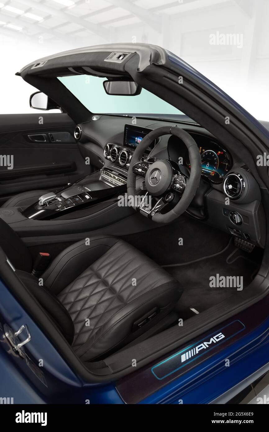 View of black interior in a Blue 2021 Mercedes AMG GTR V8 Biturbo - Stock Image