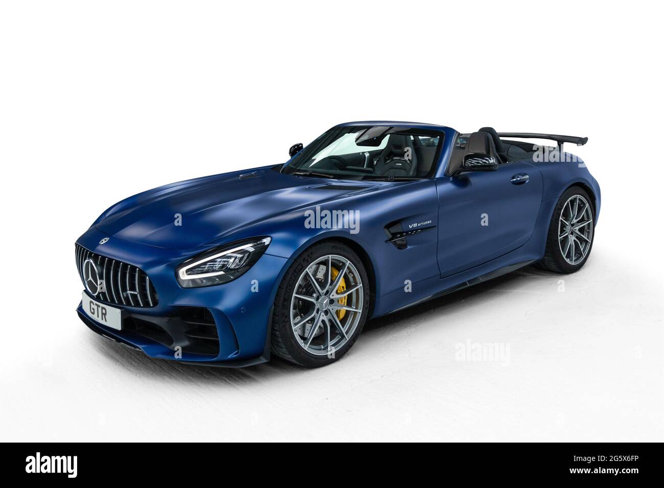 Front quarter view of a blue 2021 Mercedes AMG GTR V8 Biturbo with the hood  down Stock Photo - Alamy