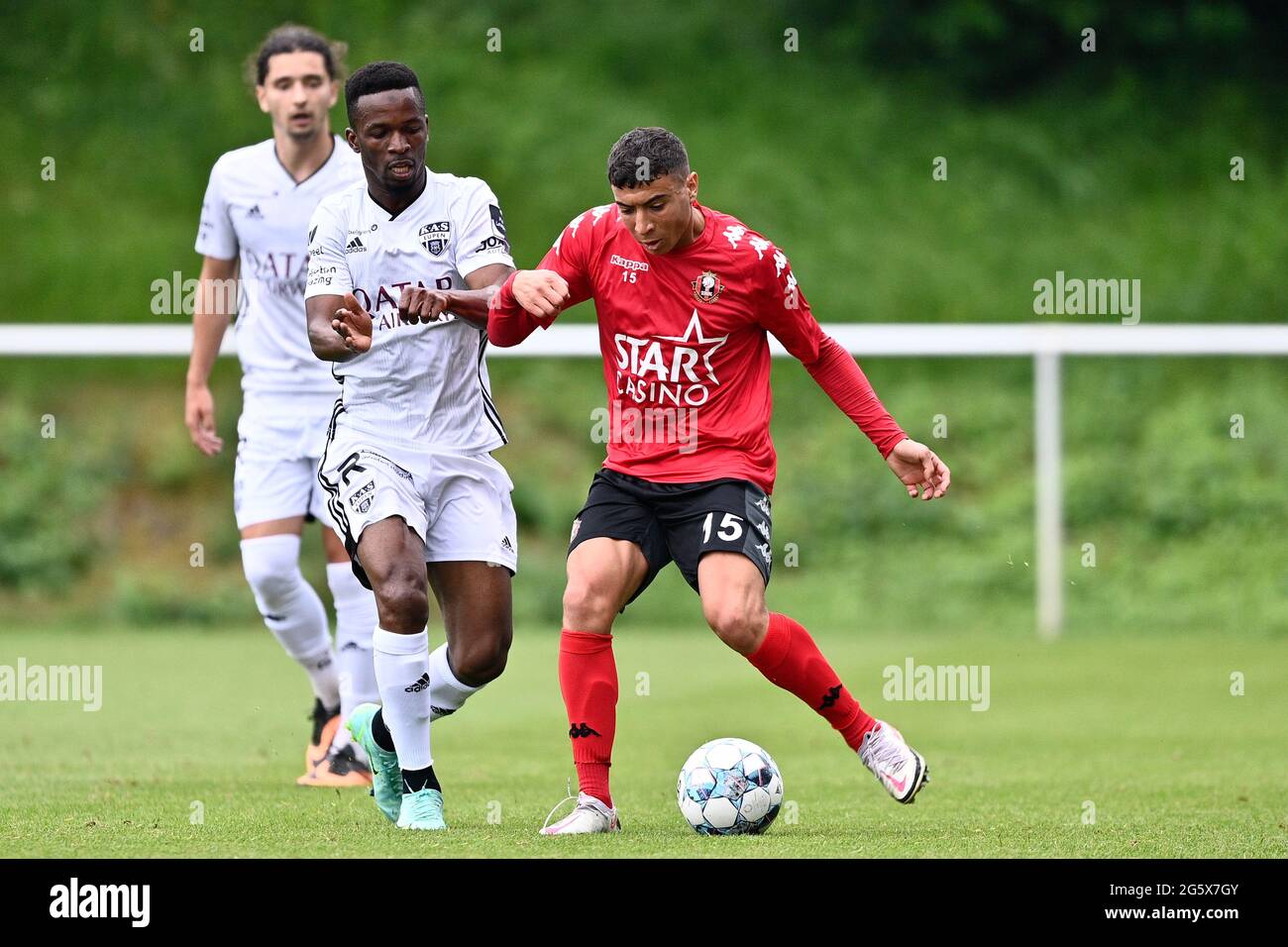 Eupen S Mamadou Kone And Seraing S Sami Lahssaini Fight For The Ball During A Friendly Soccer Game Between Kas Eupen And Rfc Seraing Wednesday 30 Jun Stock Photo Alamy