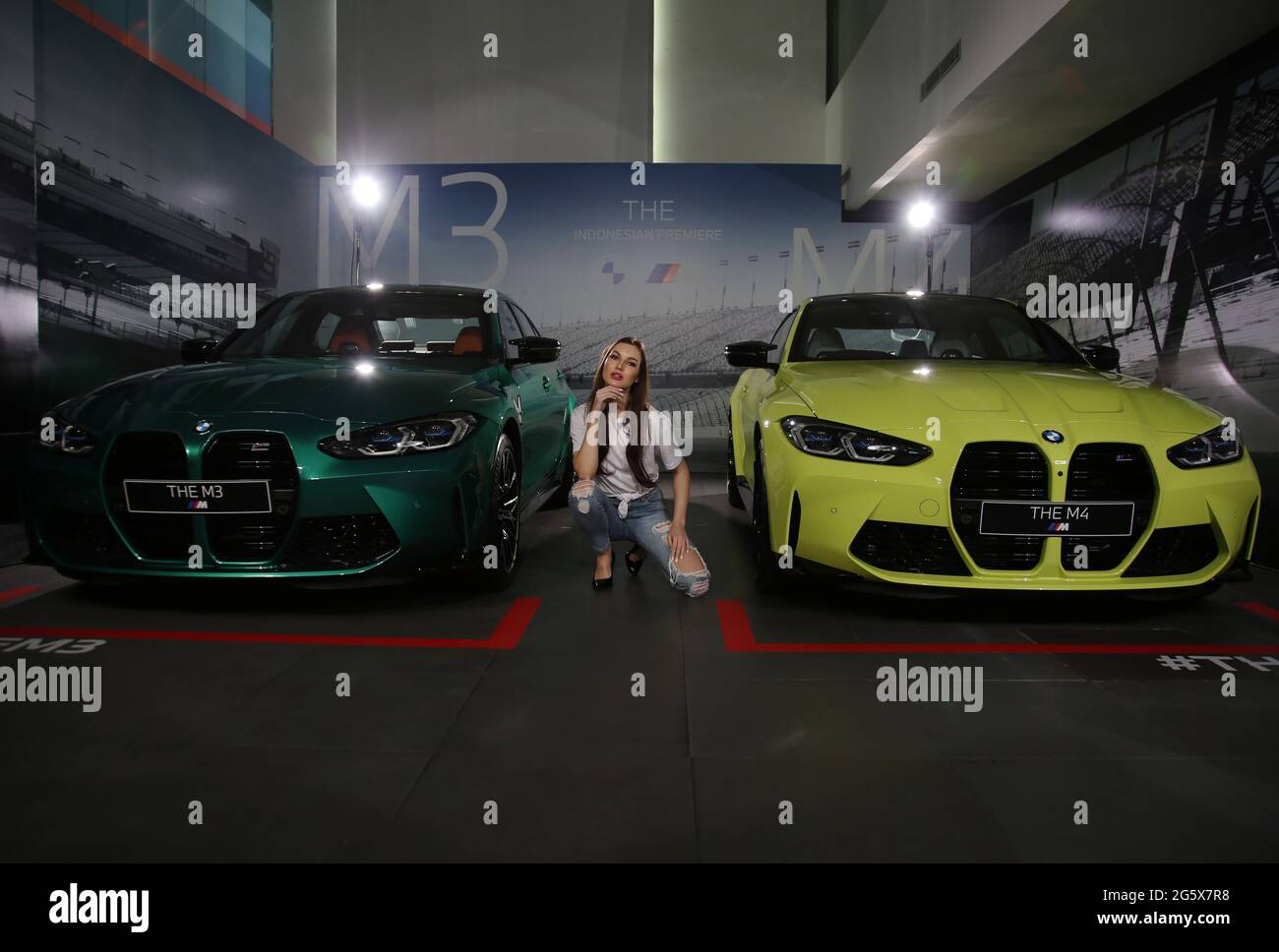 June 30 21 Jakarta Jakarta Indonesia Models Pose Between The All New Bmw M3 And M4 Competition Cars After A Virtual Launch In Jakarta June 30 21 Bmw Indonesia Launched The Two June 30 21 Jakarta Jakarta Indonesia Models Pose Between The All New Bmw M3 And M4 Competition Cars After A Virtual Launch In Jakarta June 30 21 Bmw Indonesia Launched The Two